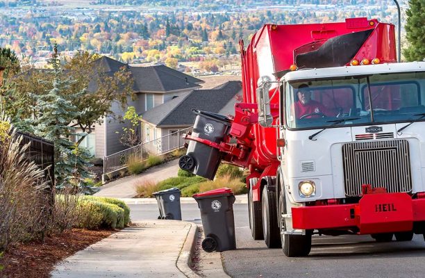 A garbage truck on the street