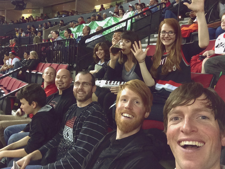 Daylight team sitting in the stands at a match