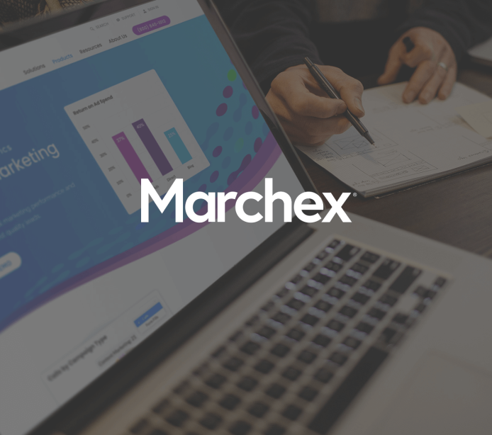 A computer with the Marchex website loaded with a Marchex logo overlaying the image